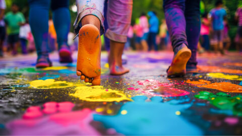 Colorful footprints walking into distance